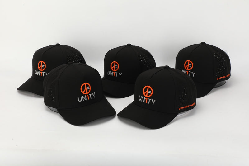 Black waterproof snapback hat by UN1TY with adjustable fit and durable design